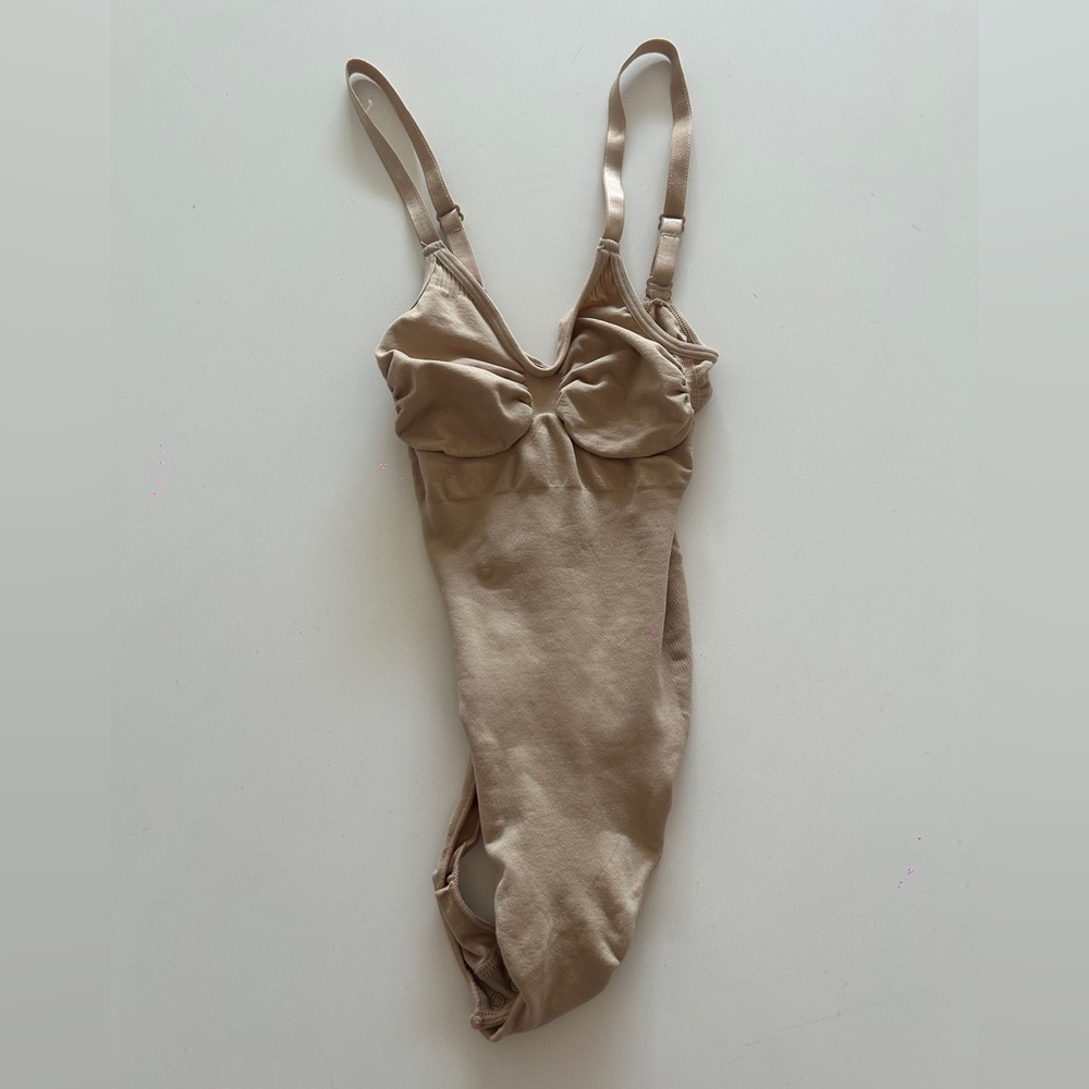 SKIMS Seamless Sculpt Shapewear Thong Bodysuit in Clay